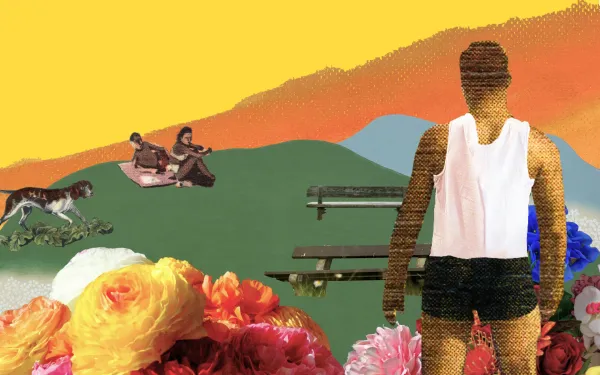 An athlete overlooking a park, where a dog is playing and people are having a picnic